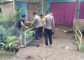 Polsek Natar Sigap Tangani Banjir di Tengah Pengamanan Nataru