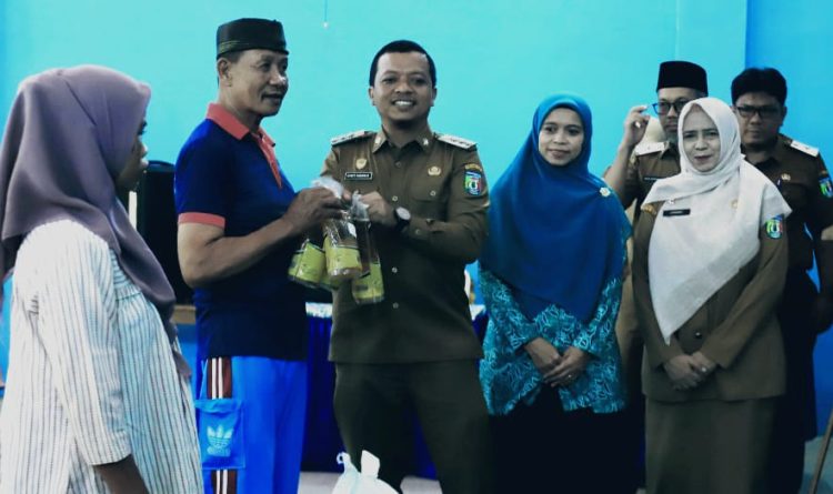 Pemkab Pringsewu Distribusikan Bantuan CPP, Warga Dapat 20 Kg Beras dan 4 Liter Minyak
